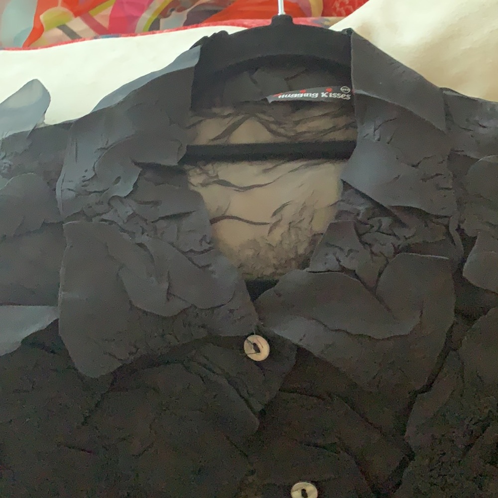 Very unusual sheer black blouse